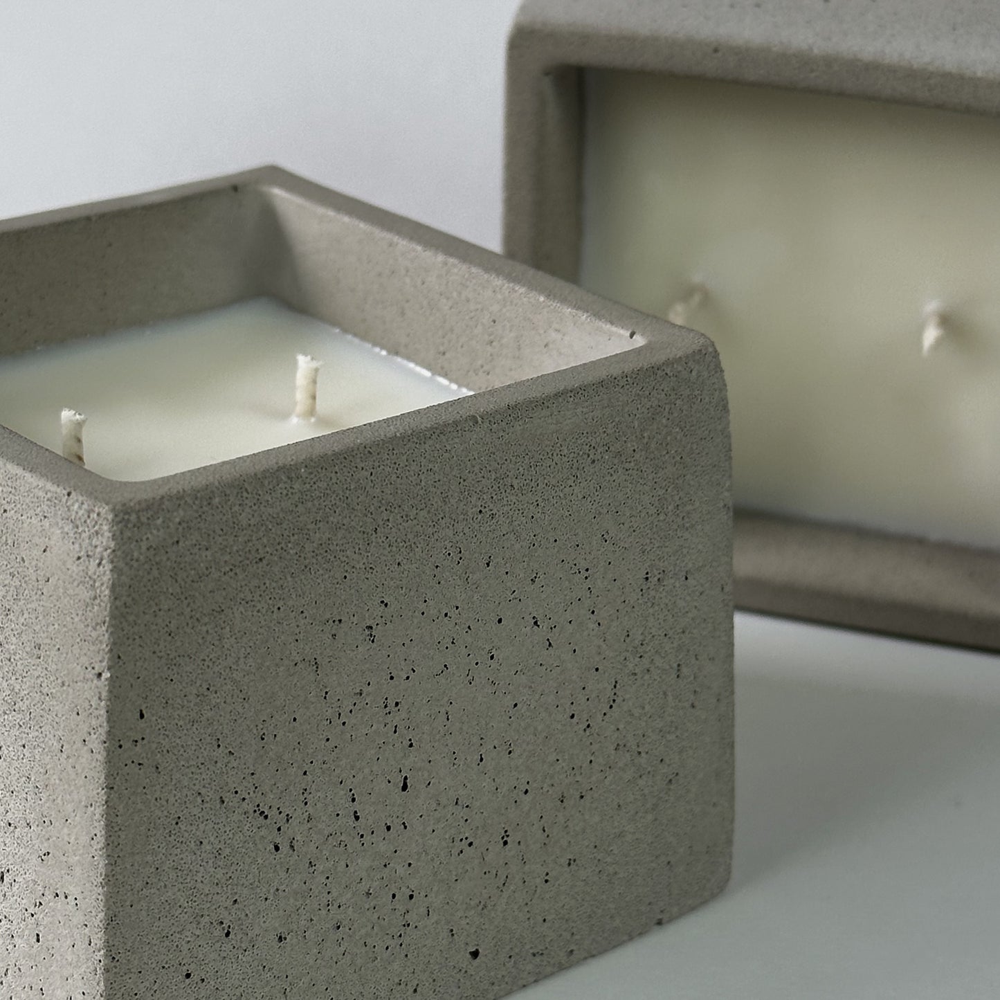 Lost in the Stacks | concrete candle