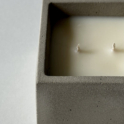 Lost in the Stacks | concrete candle