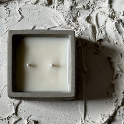 Lost in the Stacks | concrete candle